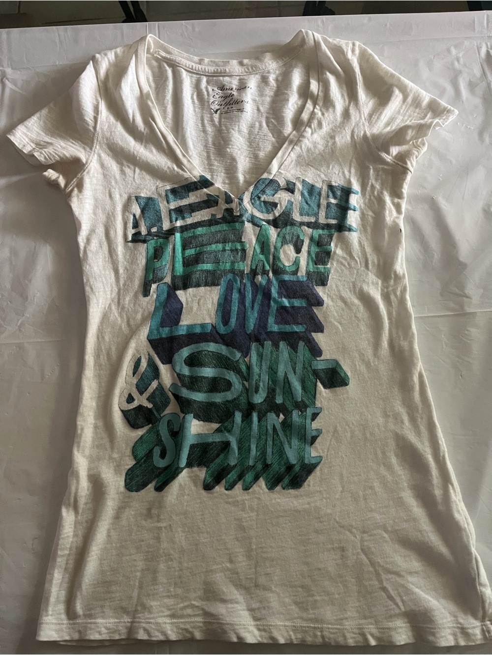 American Eagle Outfitters White V-Neck Tee with Teal and Navy Graphic